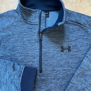 Under Armour Mens half zip fleece golf pullover.